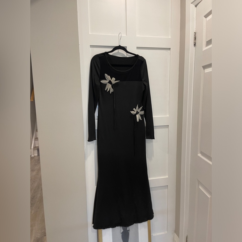 Elegant Black Dress with Floral Accents